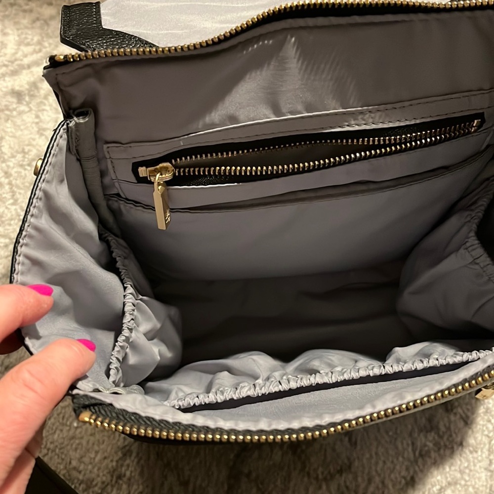 Freshly picked black pebbled leather backpack